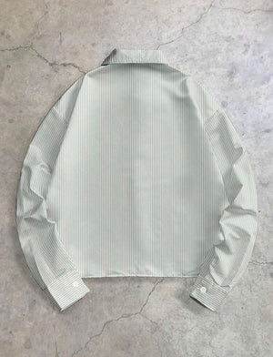 Chemise à manches longues oversize croptop avec motifs gravés