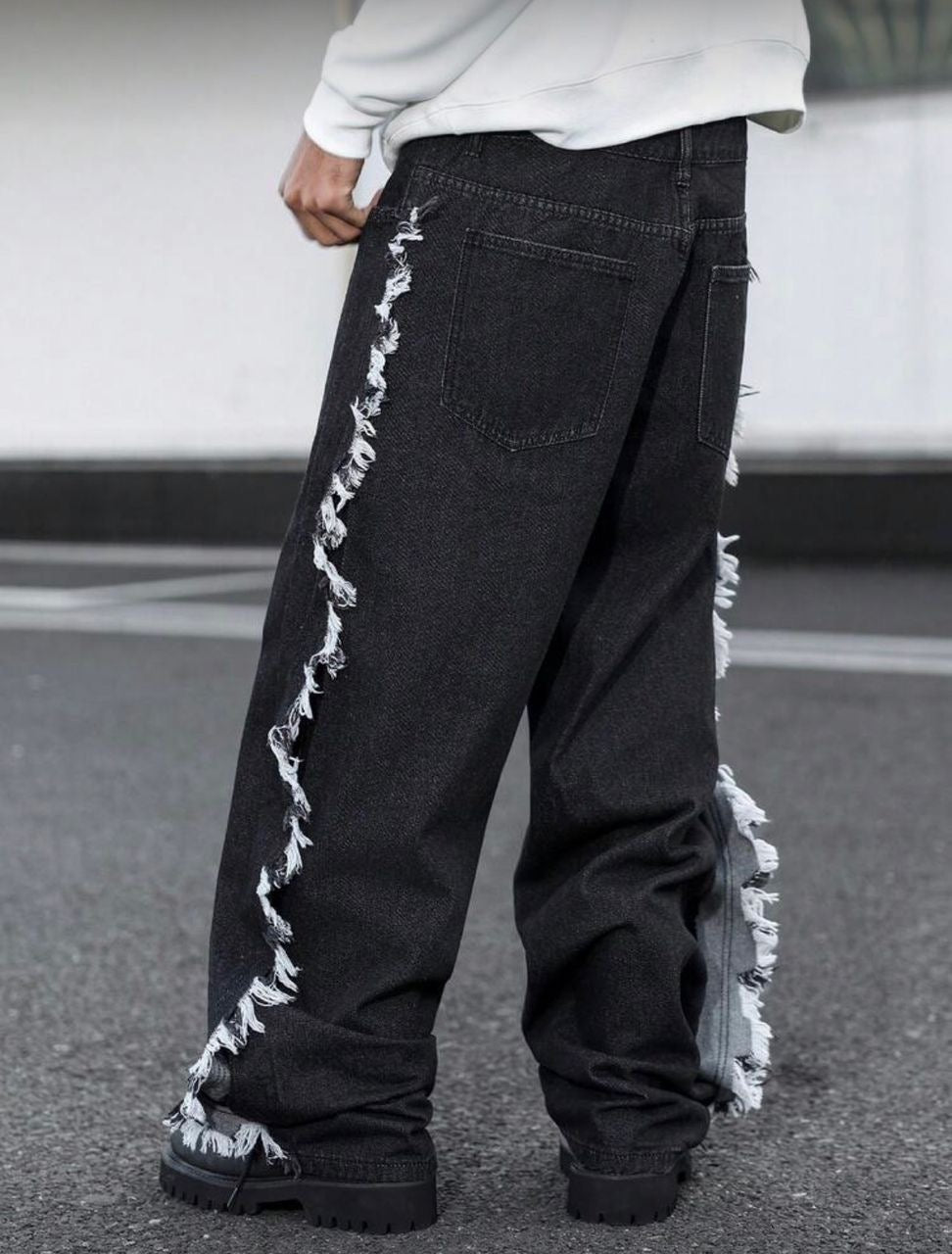 Pant Jeans noir avec motif sur les flans.