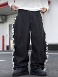 Pant Jeans noir avec motif sur les flans.